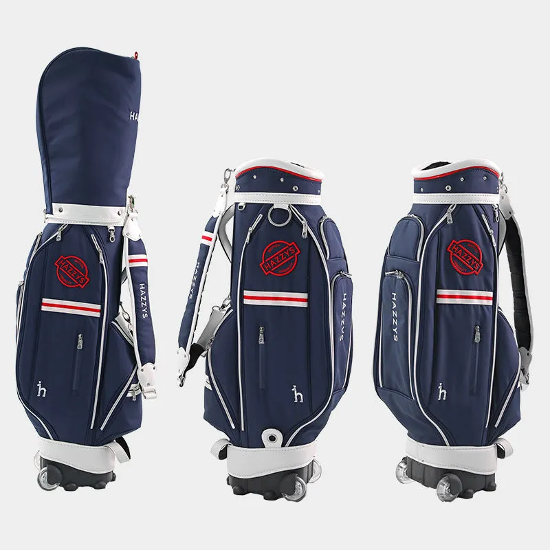 Dark blue pull rod golf bag with wheels and handle on a golf course