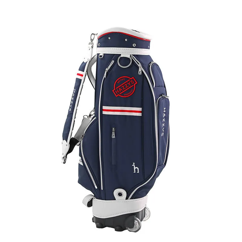 Dark blue pull rod golf bag with wheels and handle on a golf course