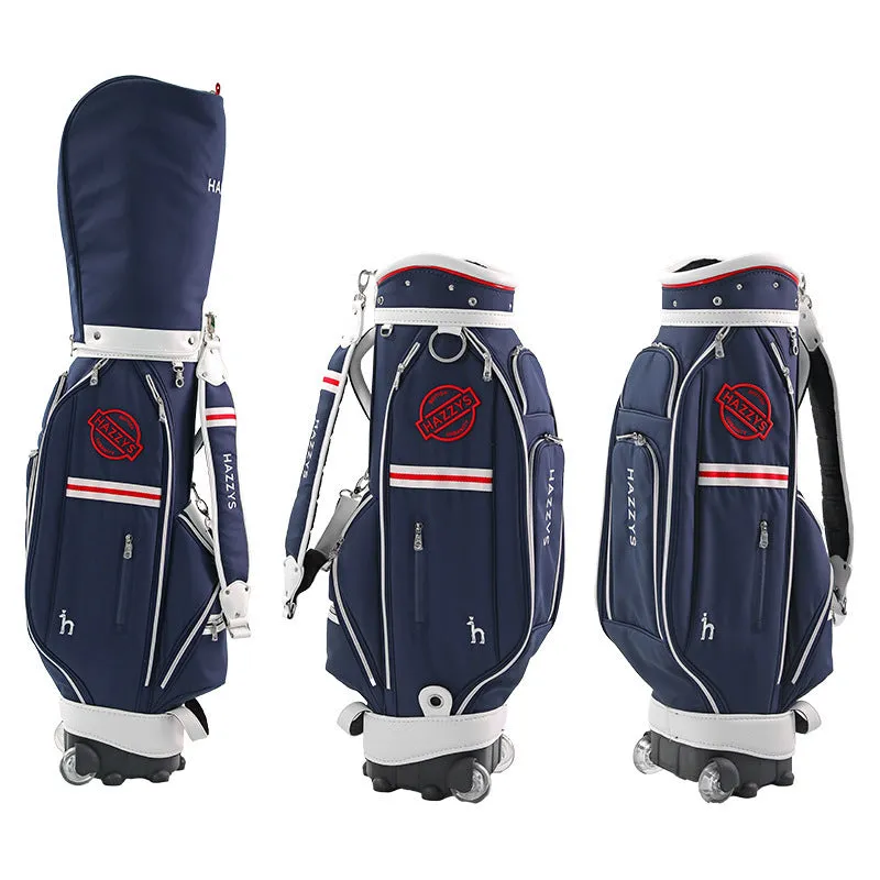 Dark blue pull rod golf bag with wheels and handle on a golf course