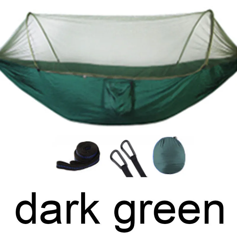 Double hammock bed 260x150cm in Army Green with mosquito-blocking mesh on a camping site