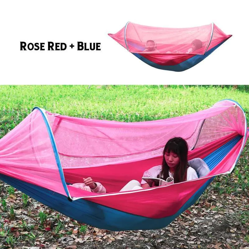 Double hammock bed 260x150cm in Army Green with mosquito-blocking mesh on a camping site