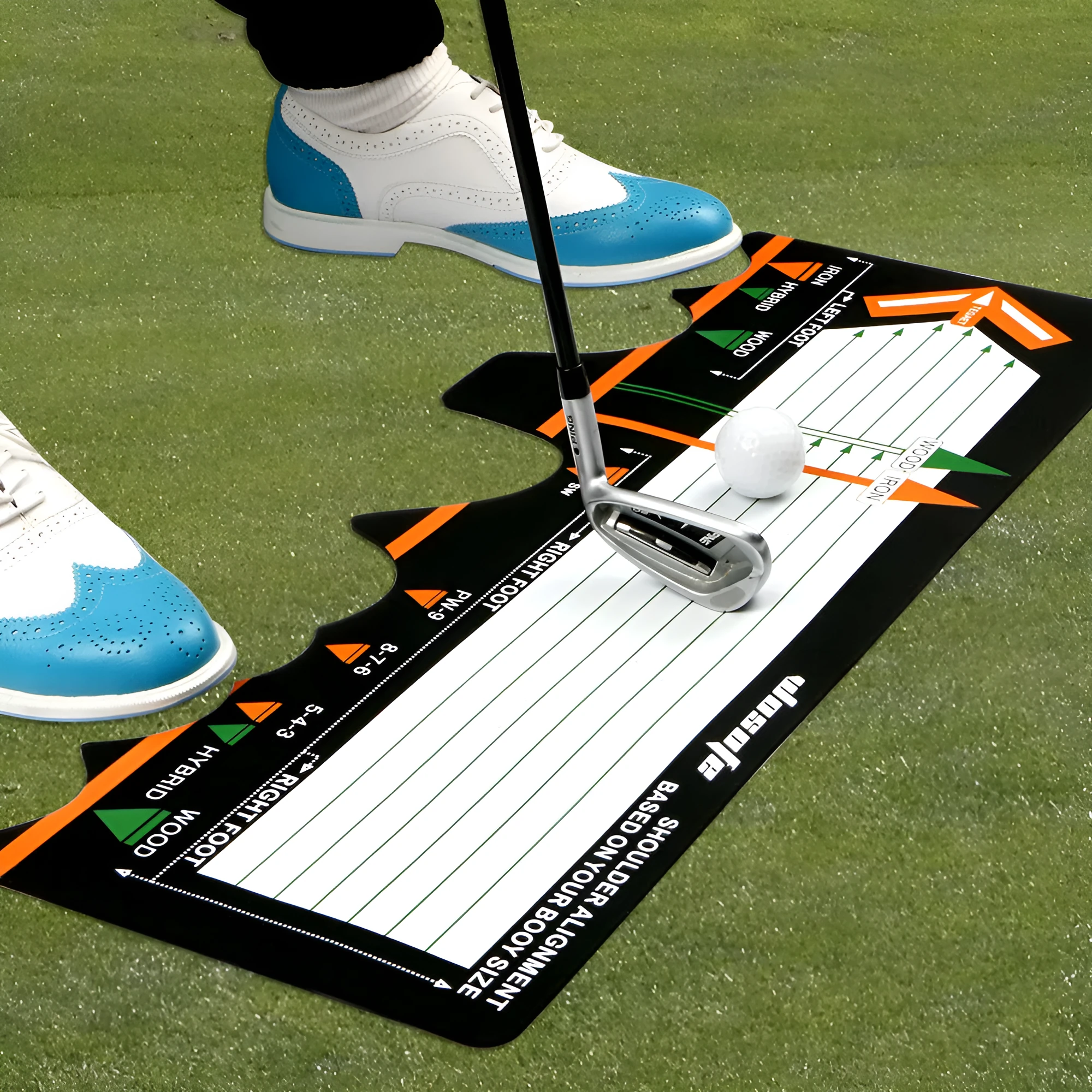 Black neoprene golf swing stance correction pad on grass