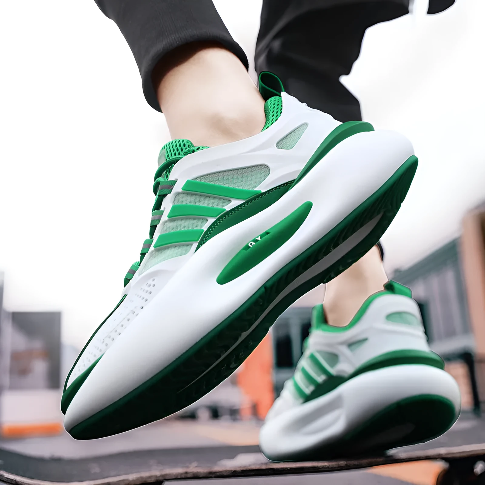 Men's mesh breathable running sneakers in white with green trim, rubber sole, front lacing, round toe