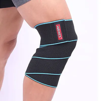 Aolikes orange lifting knee wrap with velcro fastening stretched out for squats