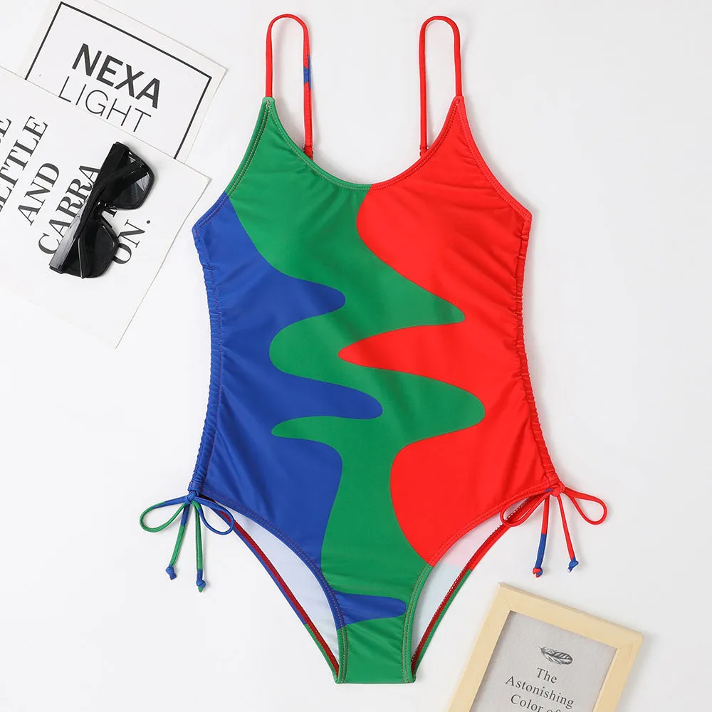Women's sleeveless one-piece swimsuit in a choice of blue, purple, brown, or green colours.