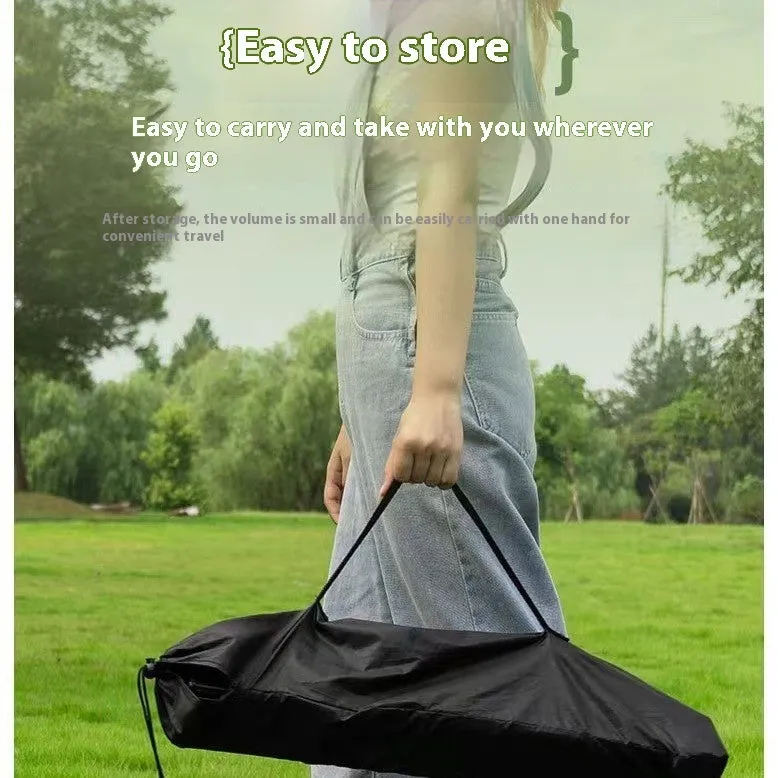 Ultralight aluminium alloy folding table in black carbon steel finish, folded flat for storage