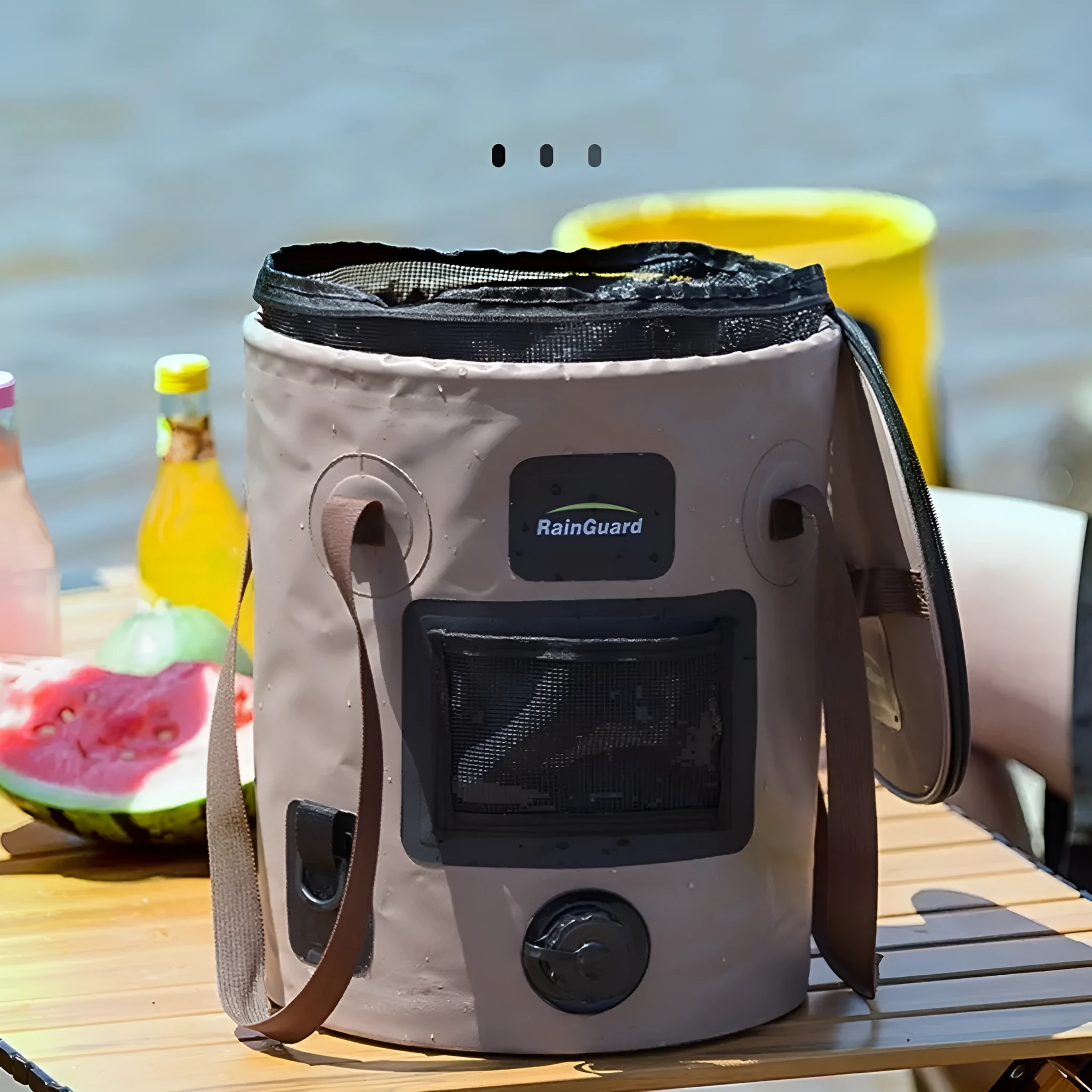 Folding fishing bucket in lemon yellow colour showing collapsed and expanded positions with mesh pocket