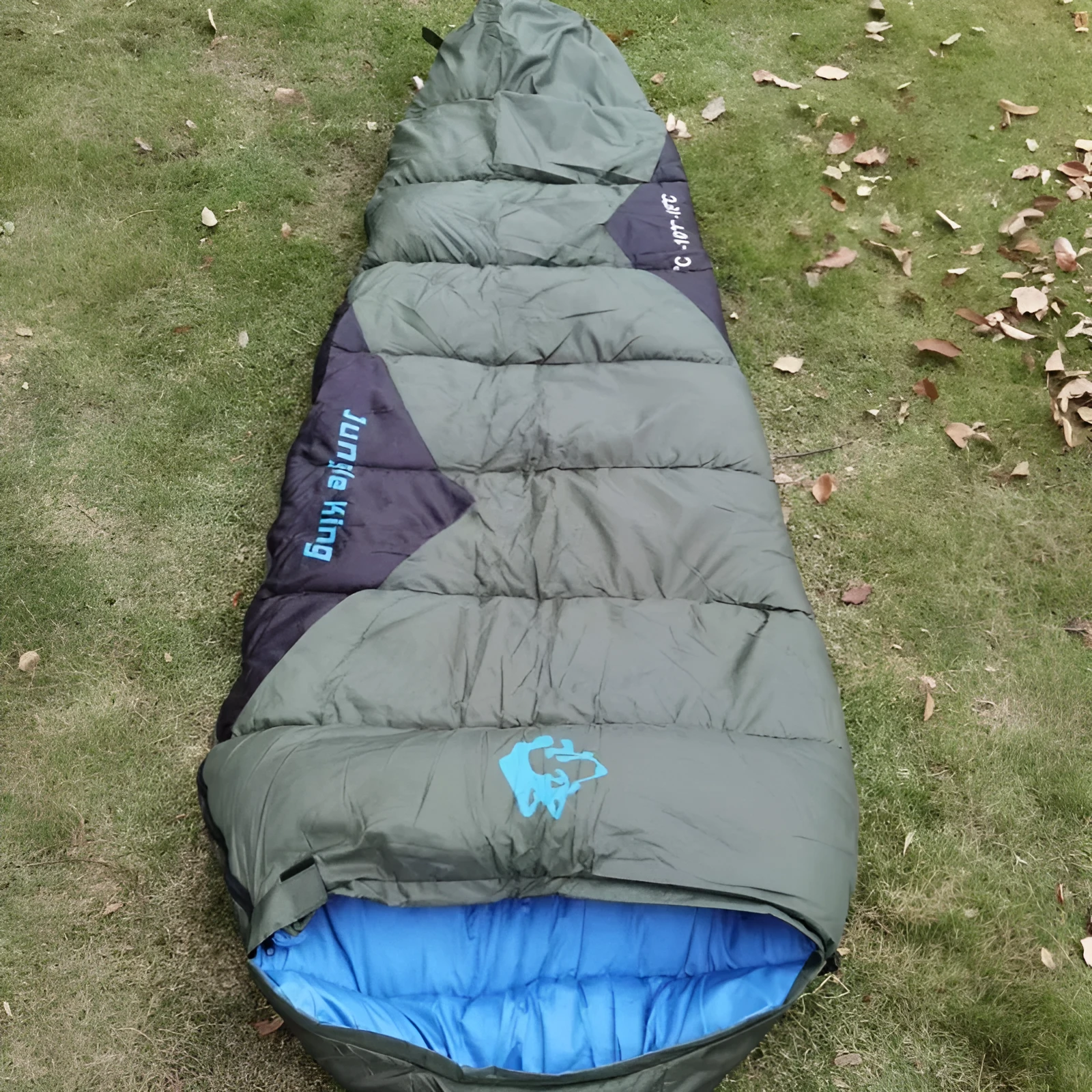 Mummy-style outdoor sleeping bag in army green with compression bag for camping