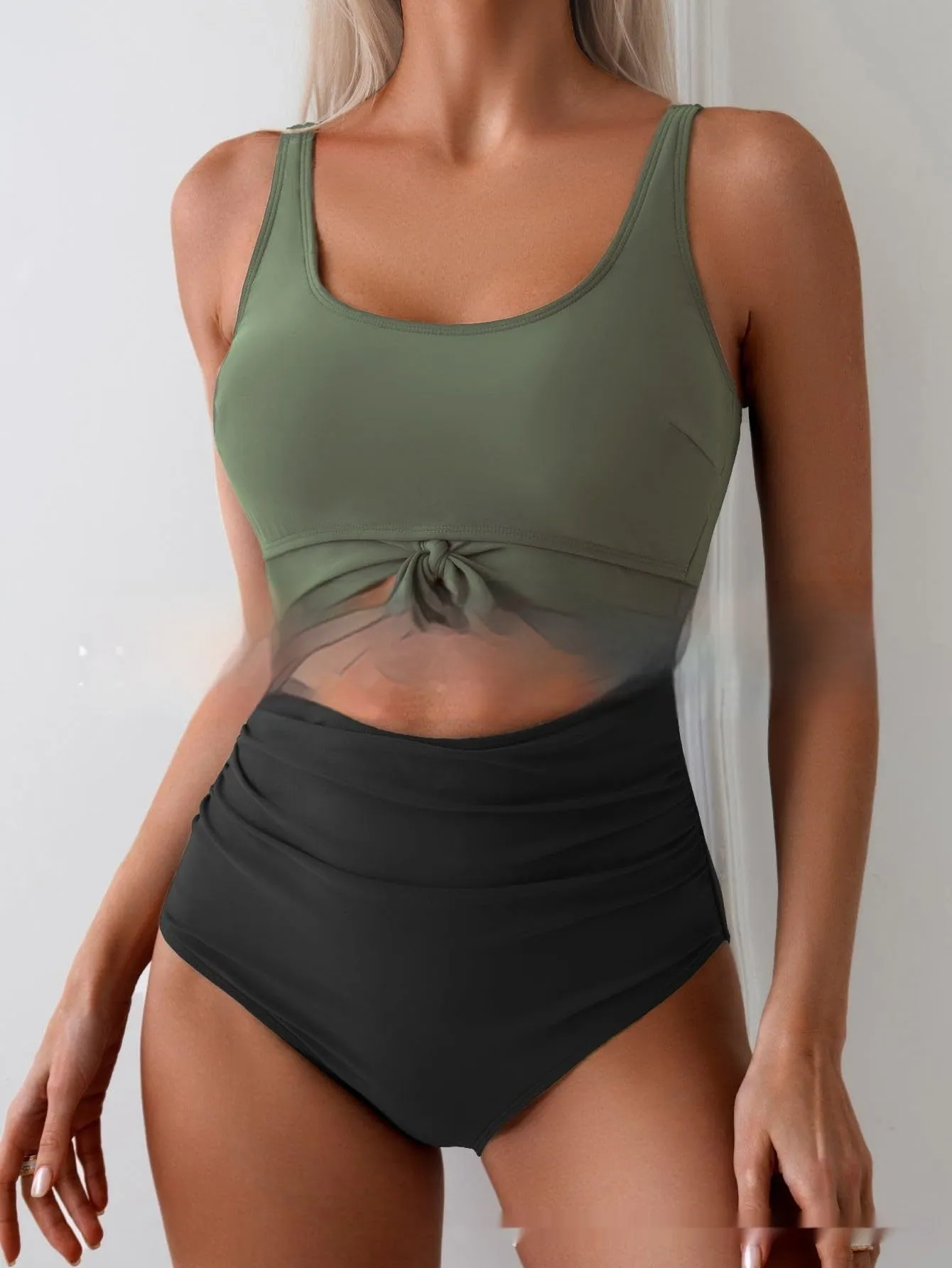 One-piece female swimsuit with contrast colour straps and covered belly in Rose-Red + Black colour option