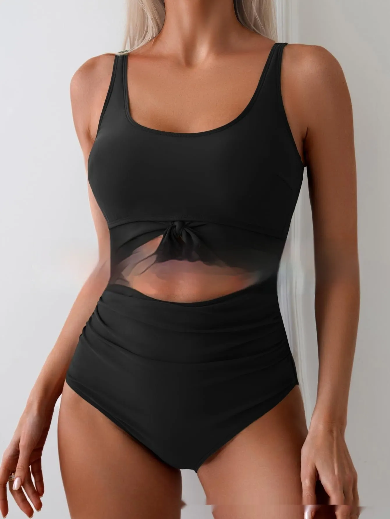 One-piece female swimsuit with contrast colour straps and covered belly in Rose-Red + Black colour option