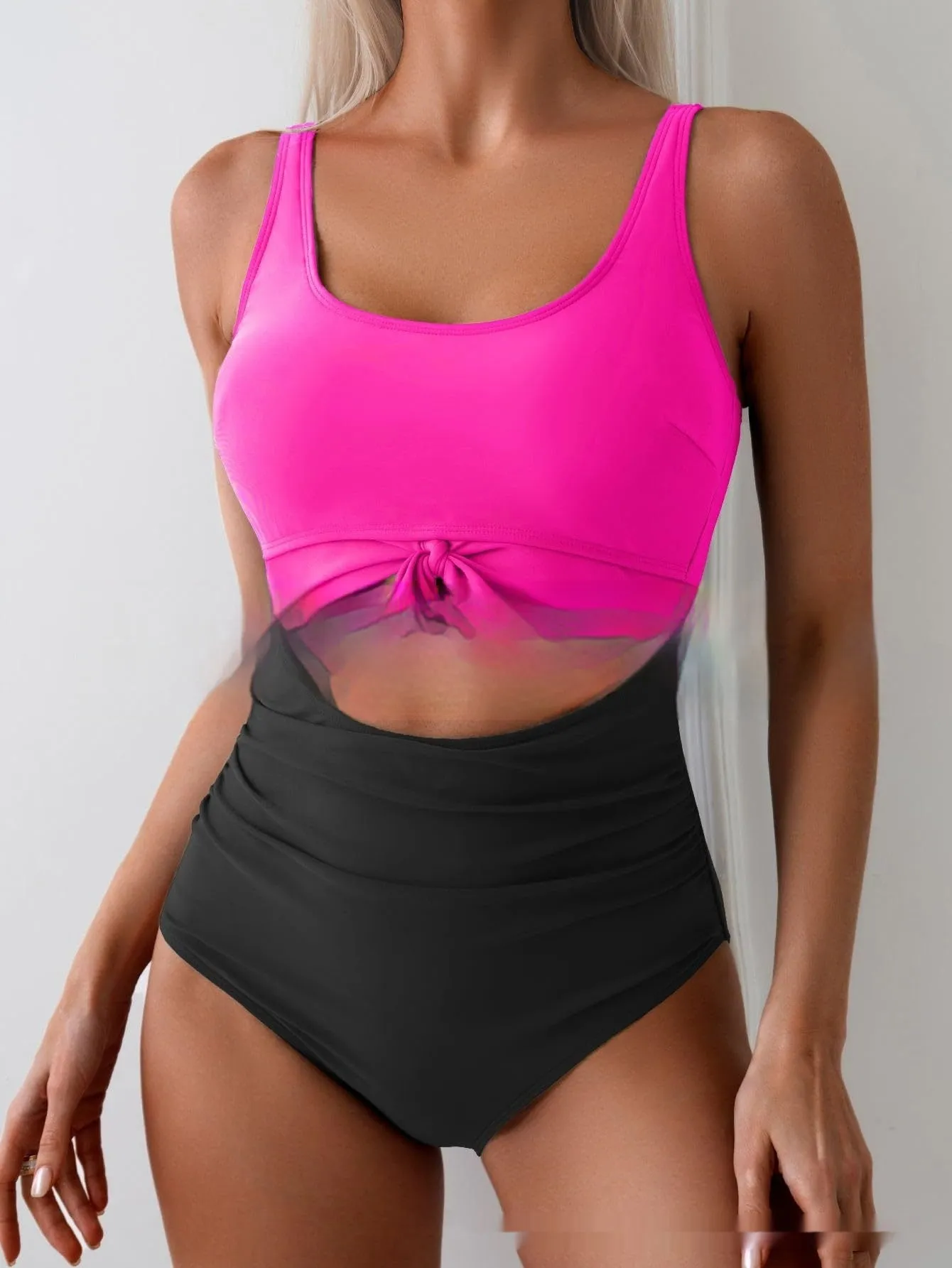 One-piece female swimsuit with contrast colour straps and covered belly in Rose-Red + Black colour option