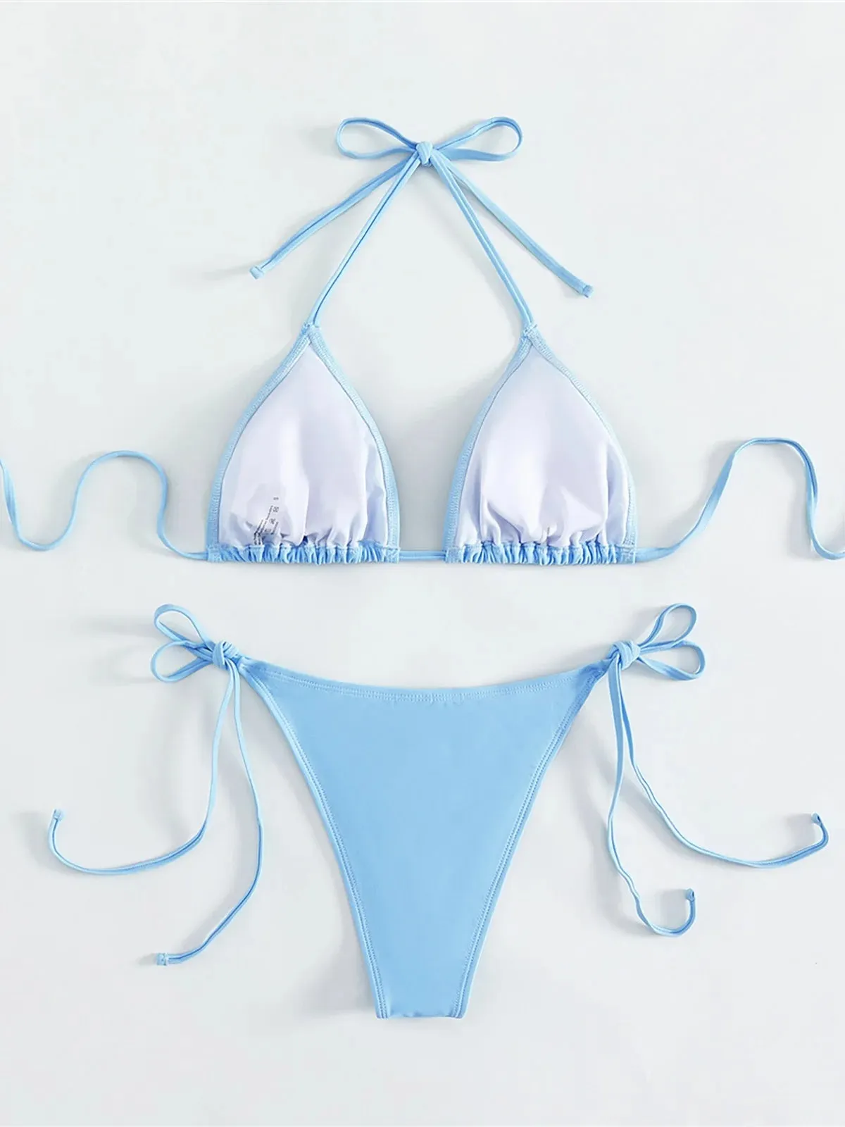 Light blue nylon women's bikini with rhinestone crystal ornament, brief cut, sleeveless