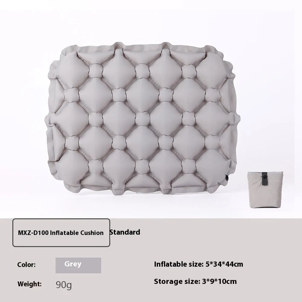 Inflatable camping cushion in grey, 40D nylon TPU, measures 5x34x44cm, lightweight and waterproof for outdoor use
