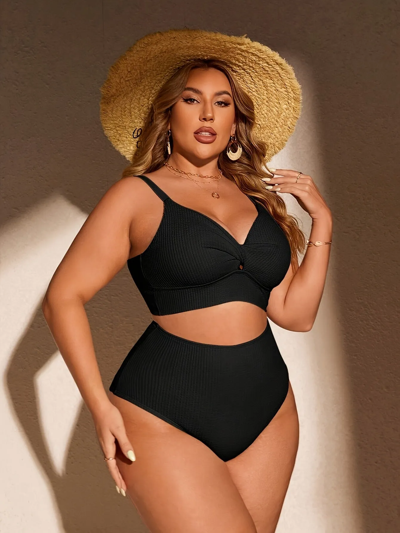 Women's black two-piece bikini set in polypropylene fibre, sizes 1XL to 4XL, with brief-style shorts