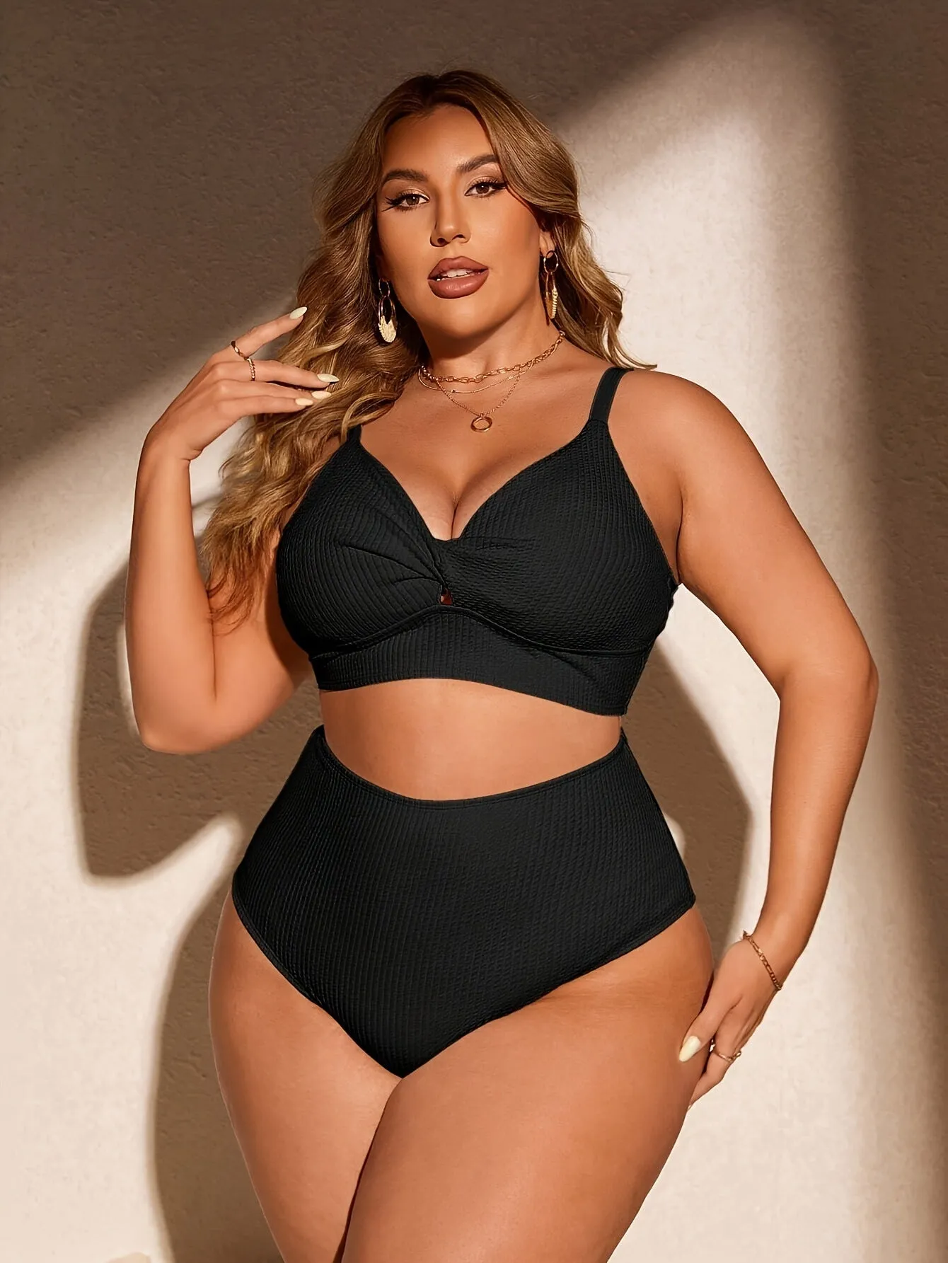 Women's black two-piece bikini set in polypropylene fibre, sizes 1XL to 4XL, with brief-style shorts