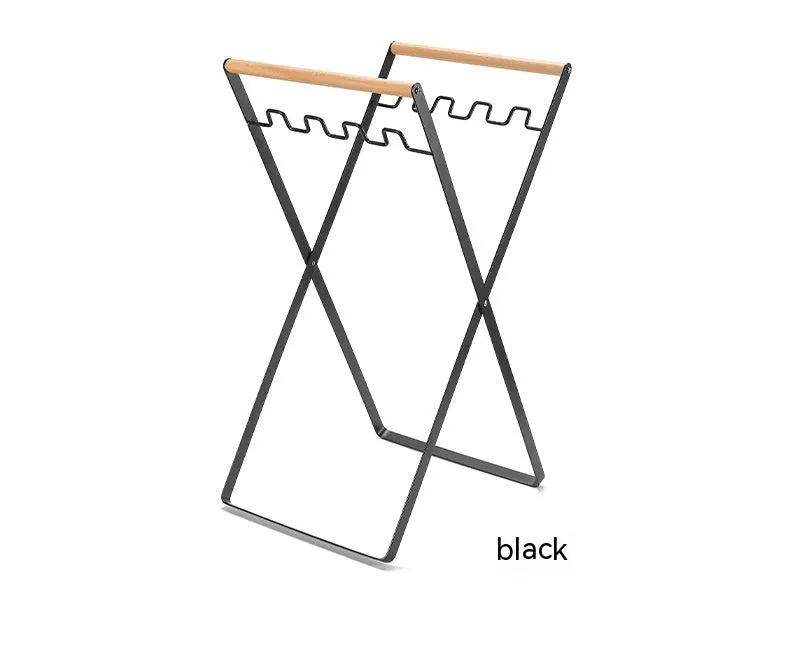 Foldable outdoor trash rack with wooden handle in black or white colour