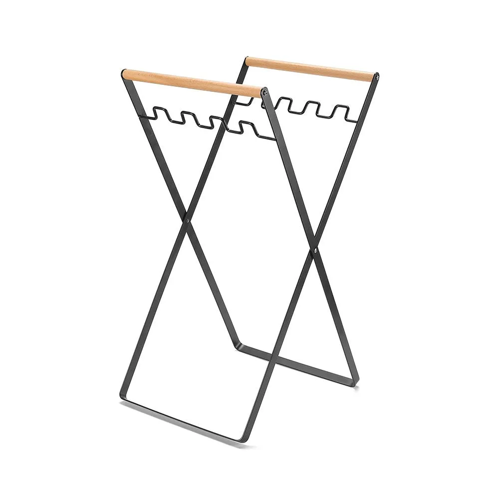 Foldable outdoor trash rack with wooden handle in black or white colour