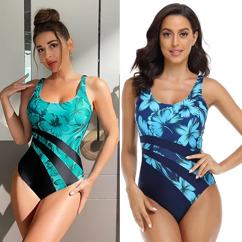 Green and blue women's conservative brief one-piece swimsuit made from polyester blend fabric.