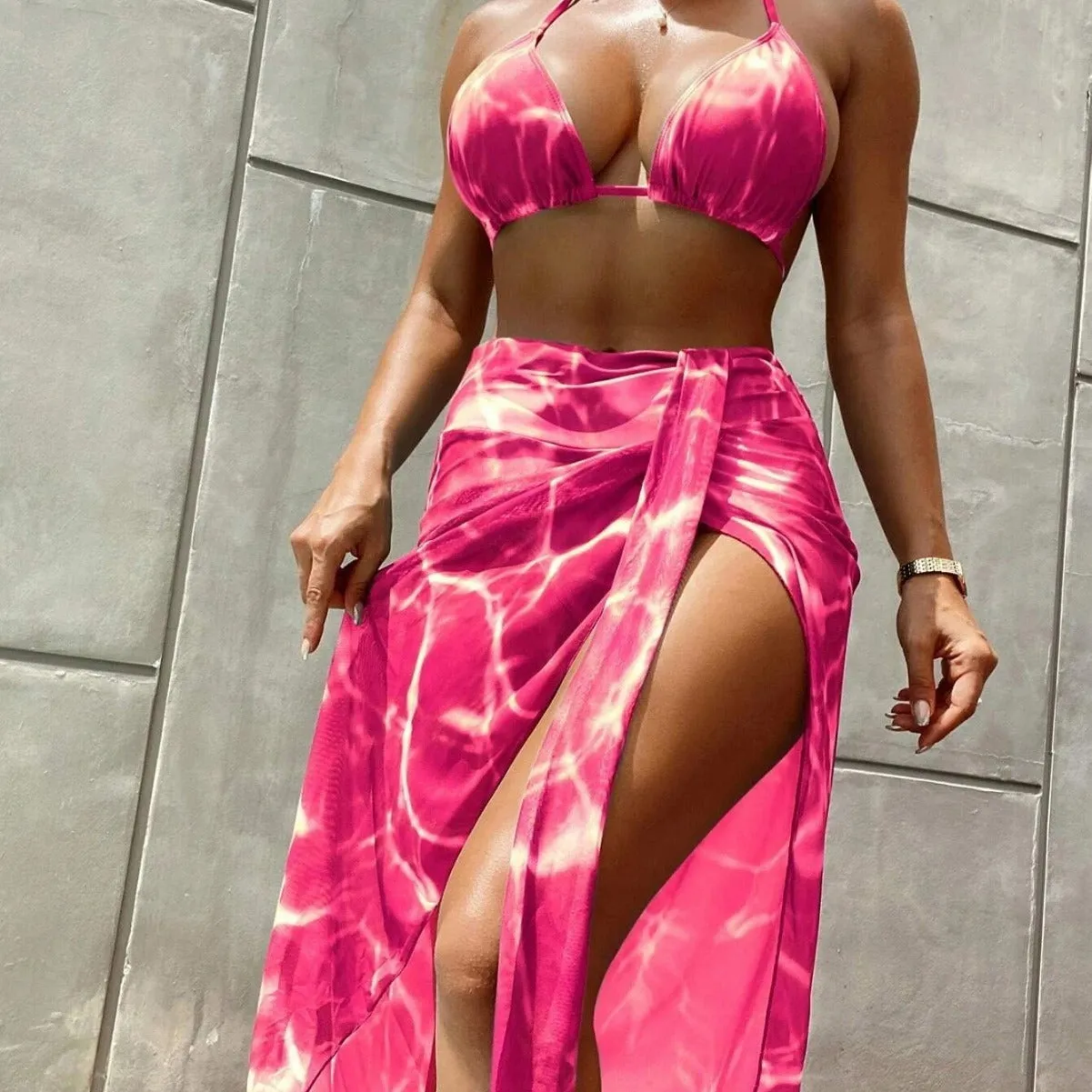 Floral print three-piece bikini swimsuit set for women, including top, pants, and skirt, in blue colour option.
