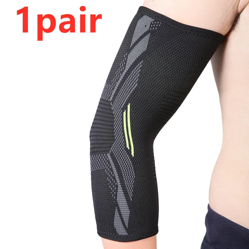 Black elbow support compression sleeve with anti-slip technical knit design on a neutral background
