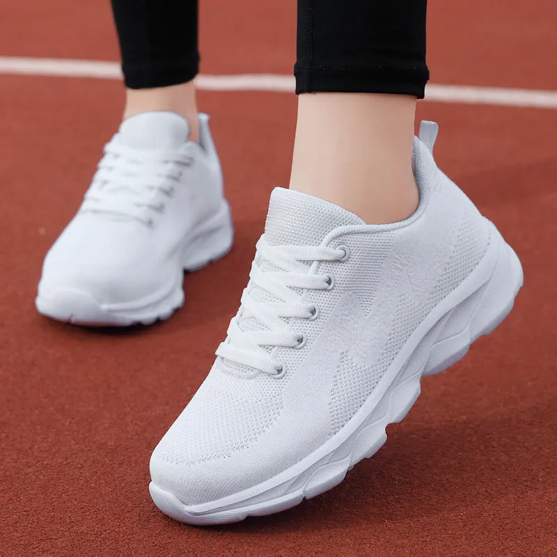 All black women's lightweight mesh sneakers with wedge heel and front lace-up design