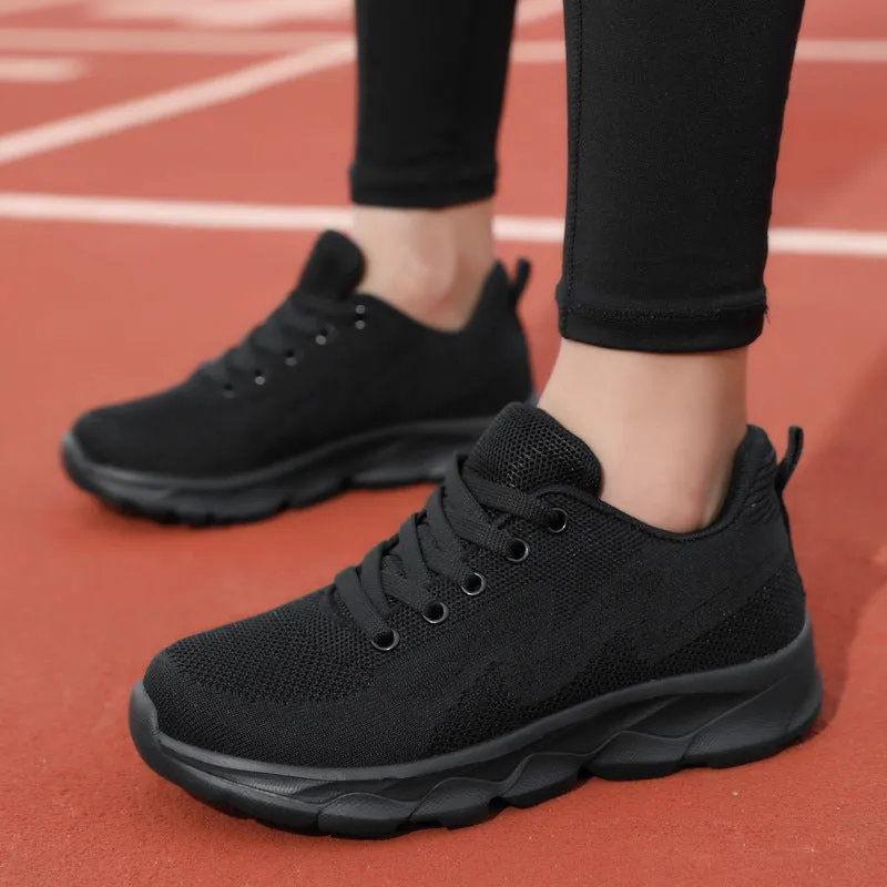 All black women's lightweight mesh sneakers with wedge heel and front lace-up design