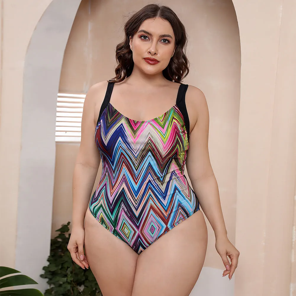 Conservative vest-style one-piece floral print swimsuit with spaghetti straps on a mannequin.