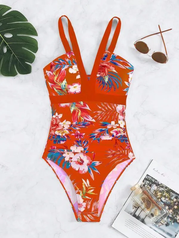 Women's floral pattern one-piece swimsuit with a backless design on a mannequin