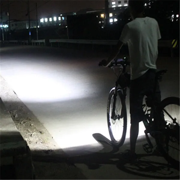 Black bicycle light with over-discharge protection for night cycling on a bike handlebar