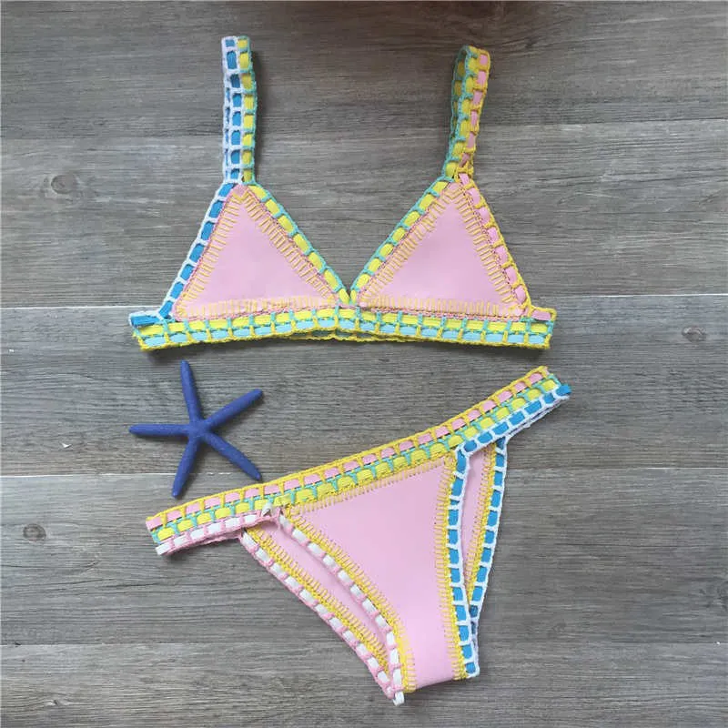 Hand crochet colourful bikini set with lace trim and rubber straps in multiple colours on white background