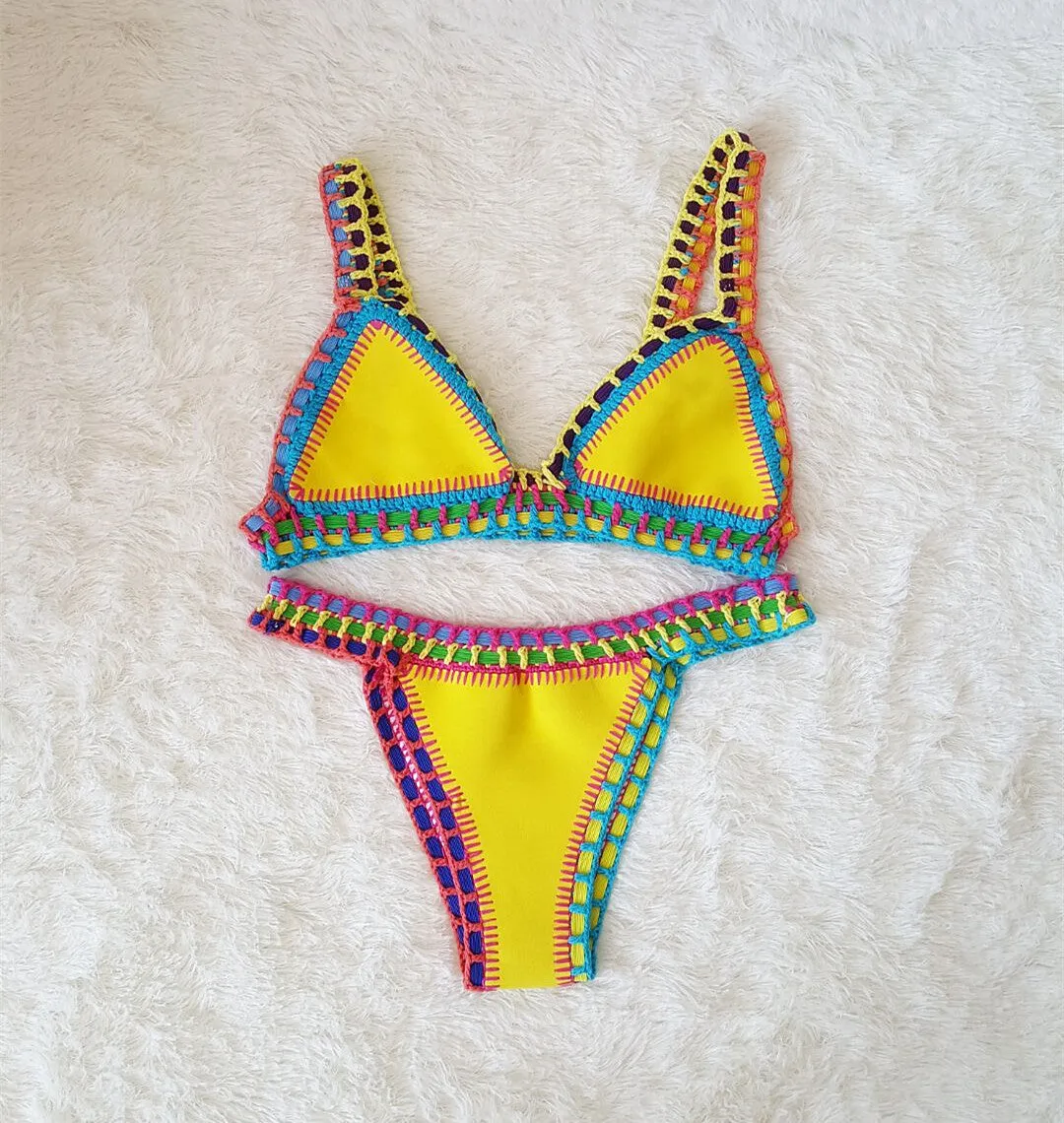 Hand crochet colourful bikini set with lace trim and rubber straps in multiple colours on white background