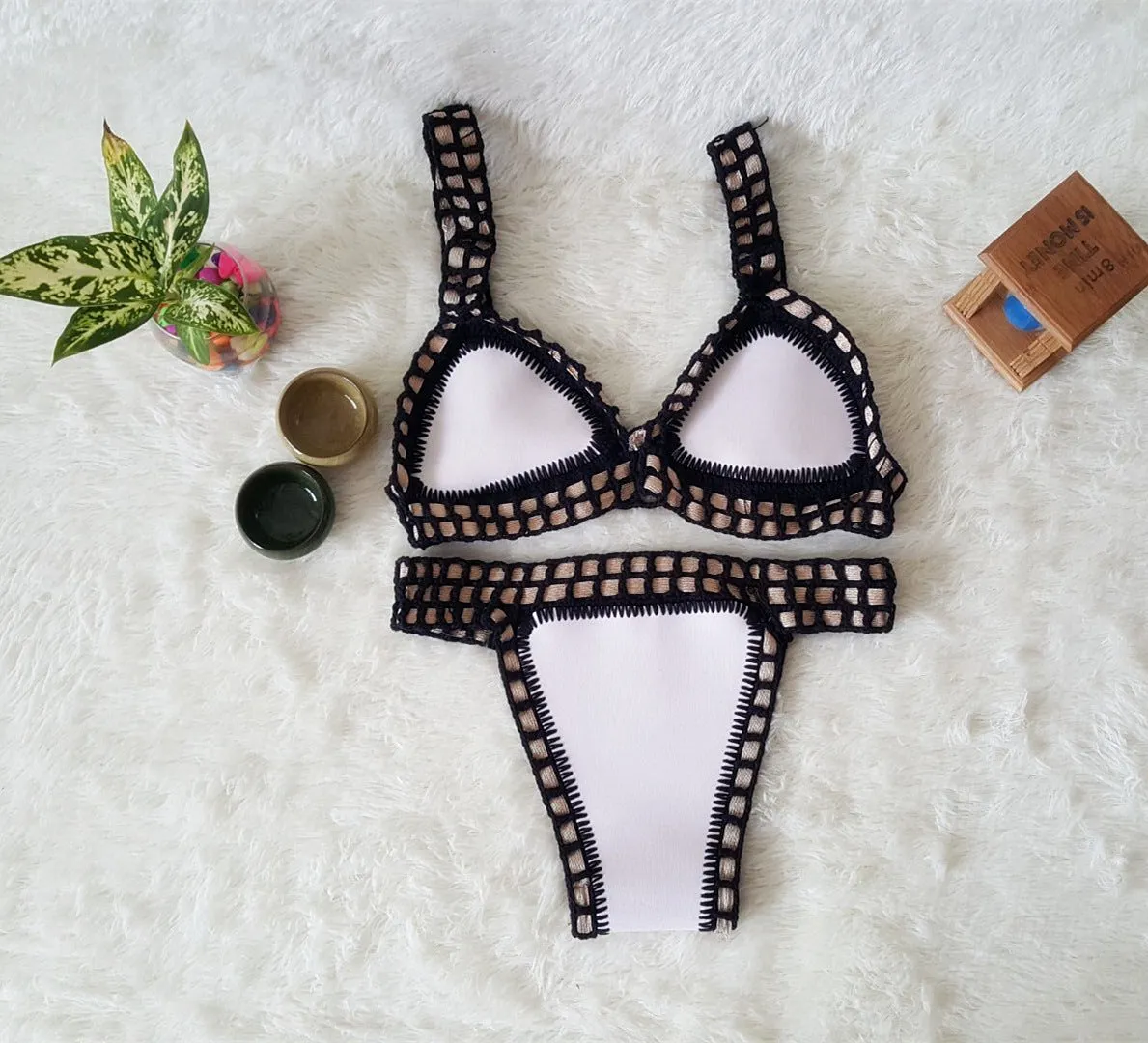 Hand crochet colourful bikini set with lace trim and rubber straps in multiple colours on white background