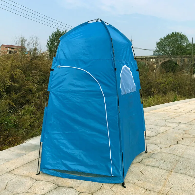 Outdoor dressing tent 120x120x210cm in blue with glass fibre pole structure set up on a beach