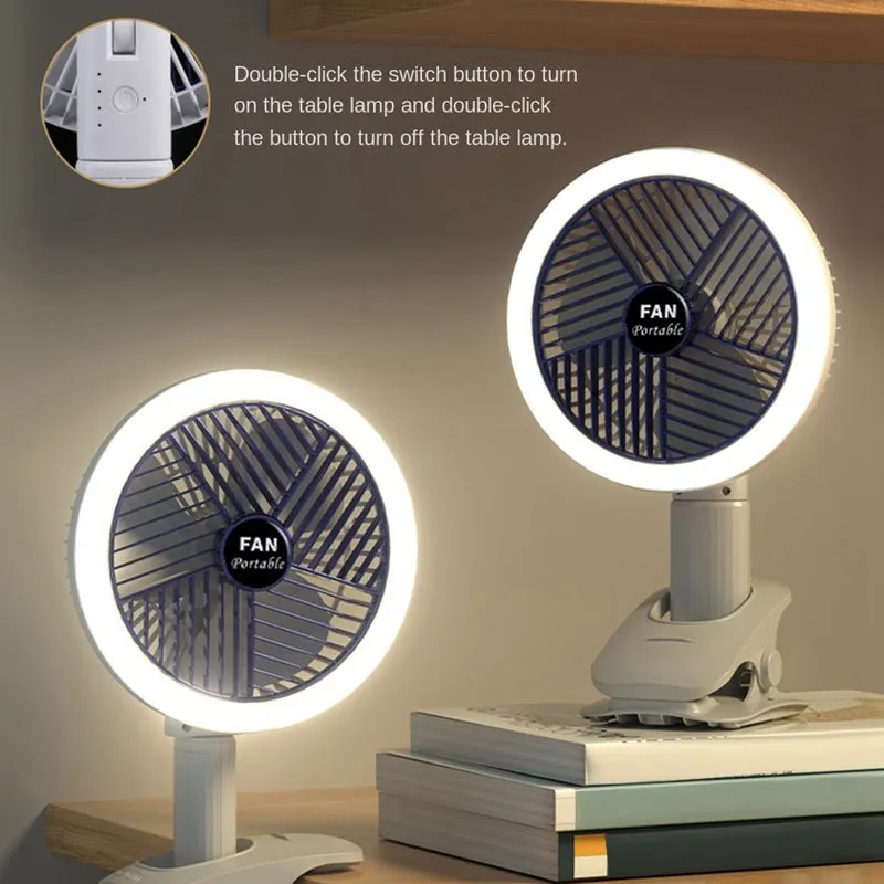 White and blue plastic rechargeable clip fan with USB cable, 29x18cm, clamped on a desk edge