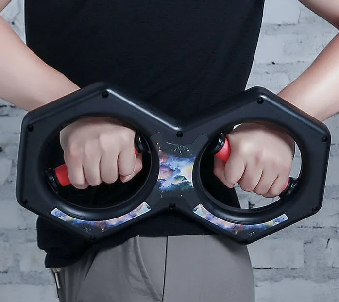 Black ABS figure 8 wrist power machine grip trainer on desk