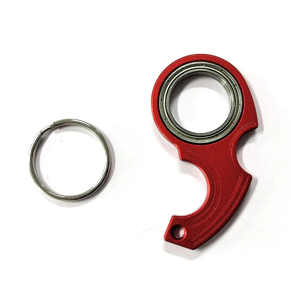 Metal texture rotating keychain in karambit style with key ring in black colour