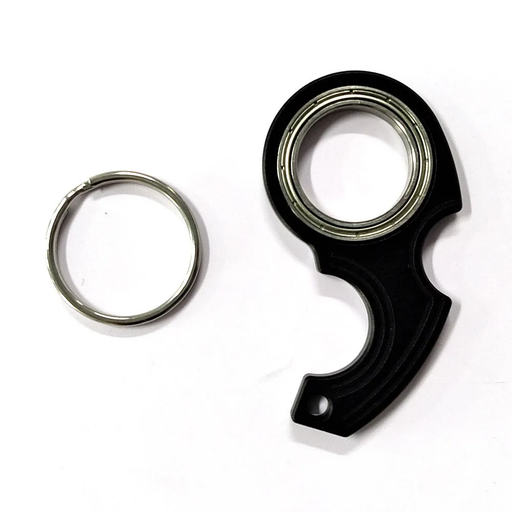 Metal texture rotating keychain in karambit style with key ring in black colour