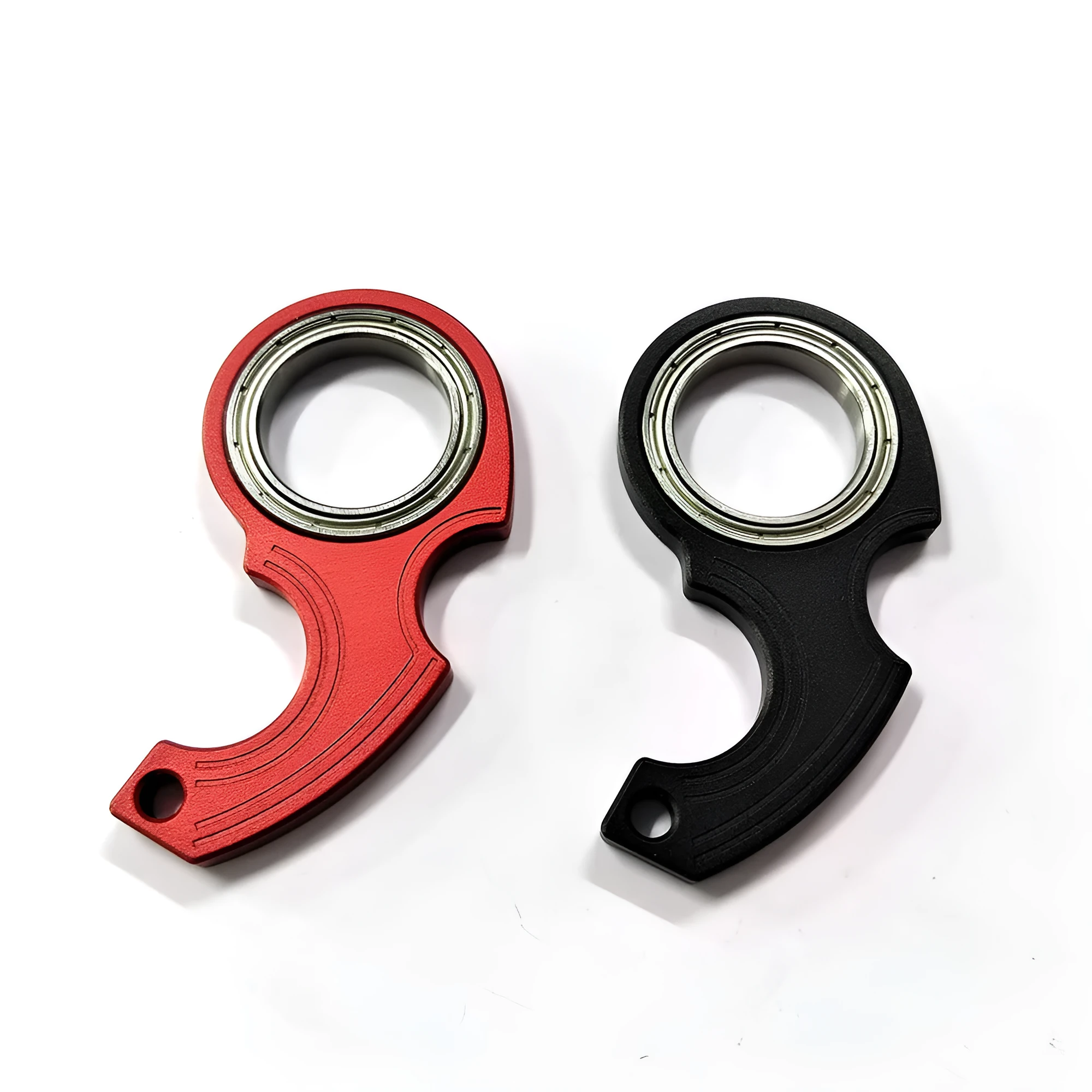 Metal texture rotating keychain in karambit style with key ring in black colour