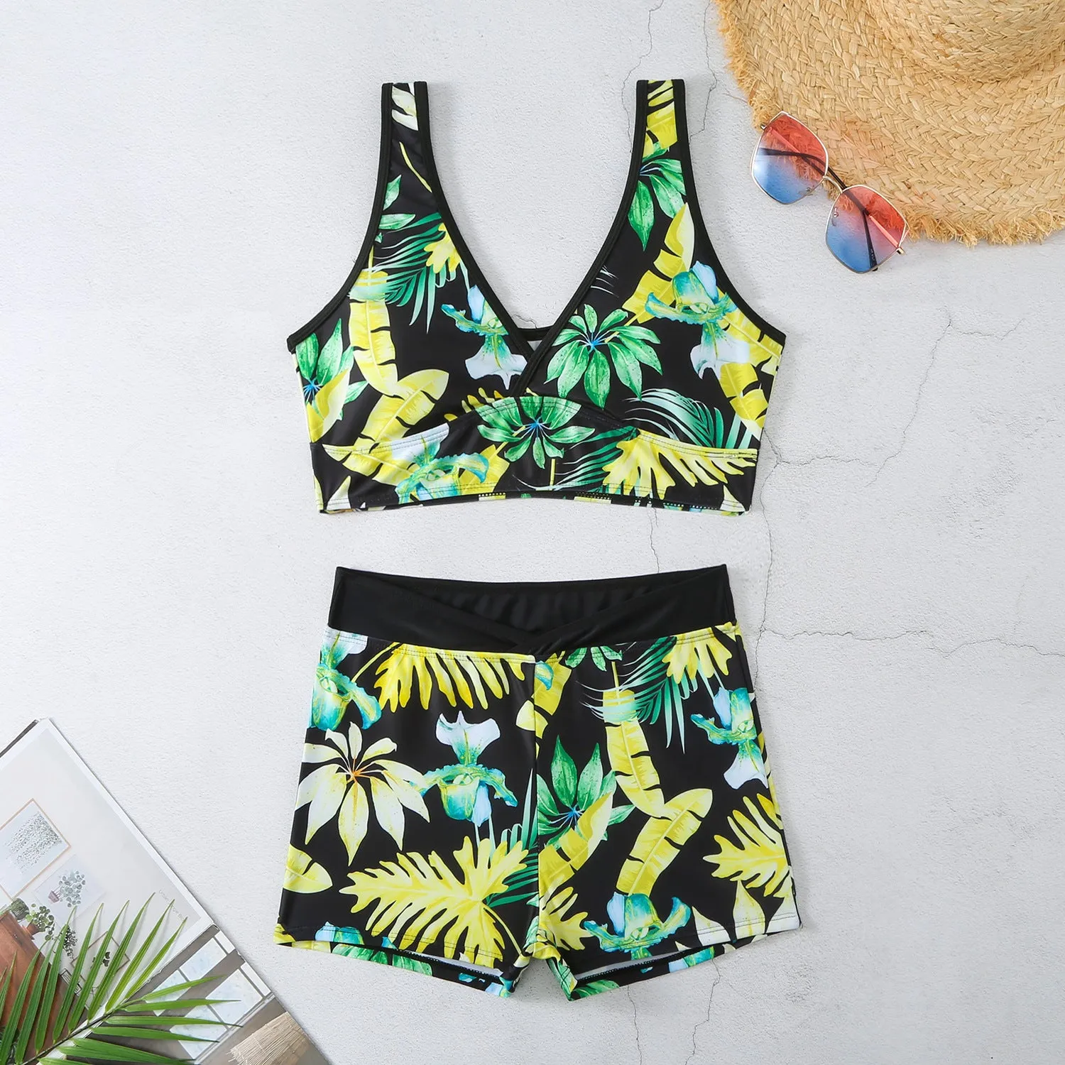 Two-piece female swimsuit set with printed boxer brief bottoms and sleeveless top