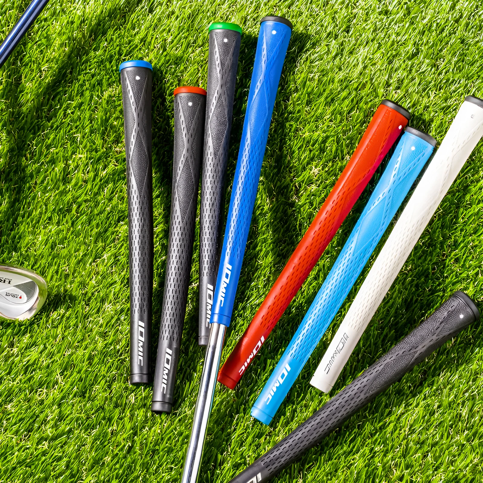 TPE material golf club grip shown in various colours including pink, red, and two-tone black with blue head.