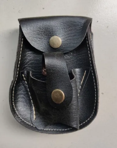 Leather slingshot belt bag with steel balls and marbles, black colour, outdoor use