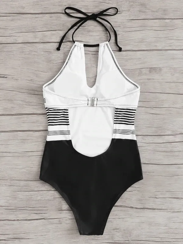 Black striped one-piece swimsuit for women made from nylon fabric, front view