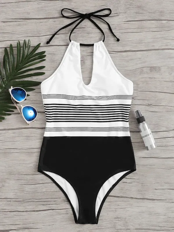 Black striped one-piece swimsuit for women made from nylon fabric, front view