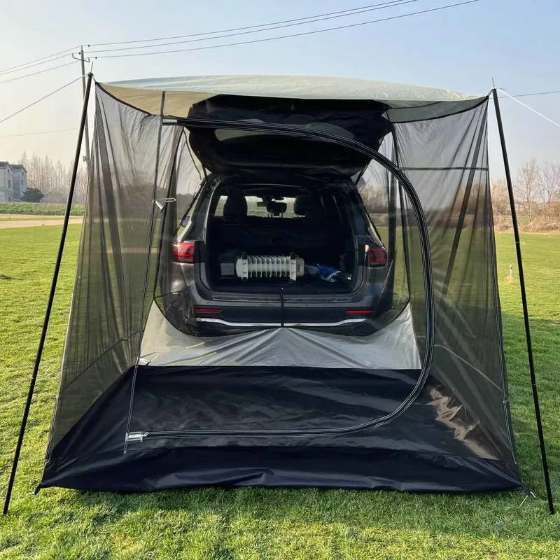 Car tail extension tent set up at a campsite with rear access, showing 190T silver-coated anti-UV fabric and screen windows.