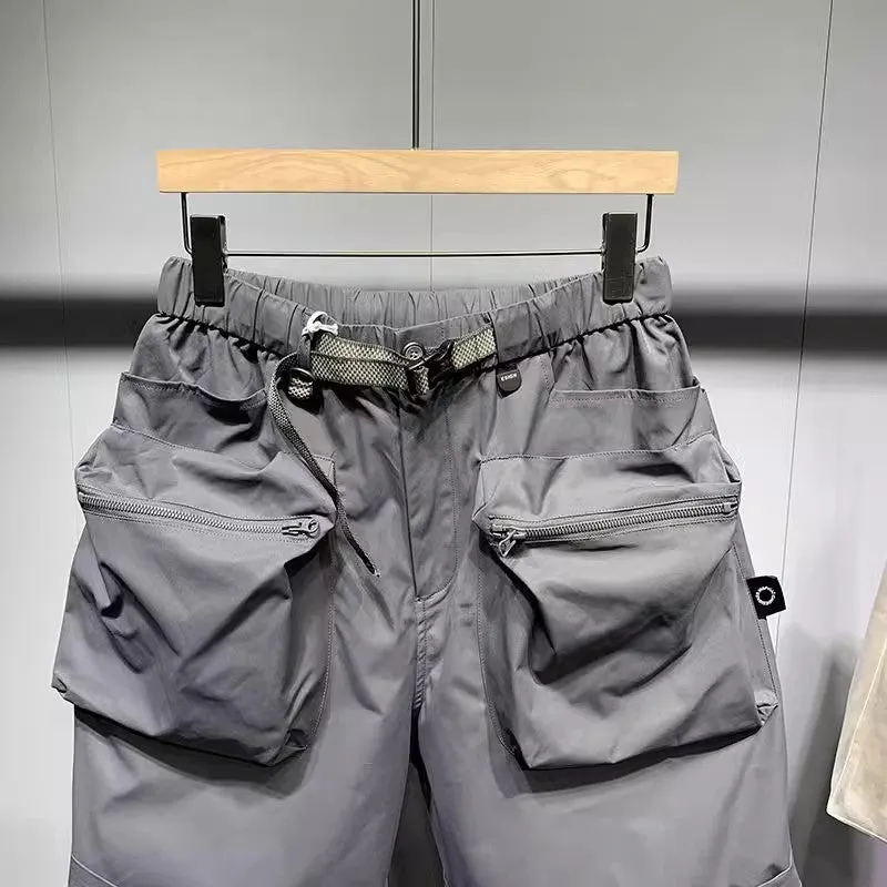 Men's large size work shorts with pockets in black or grey with straight-leg styling