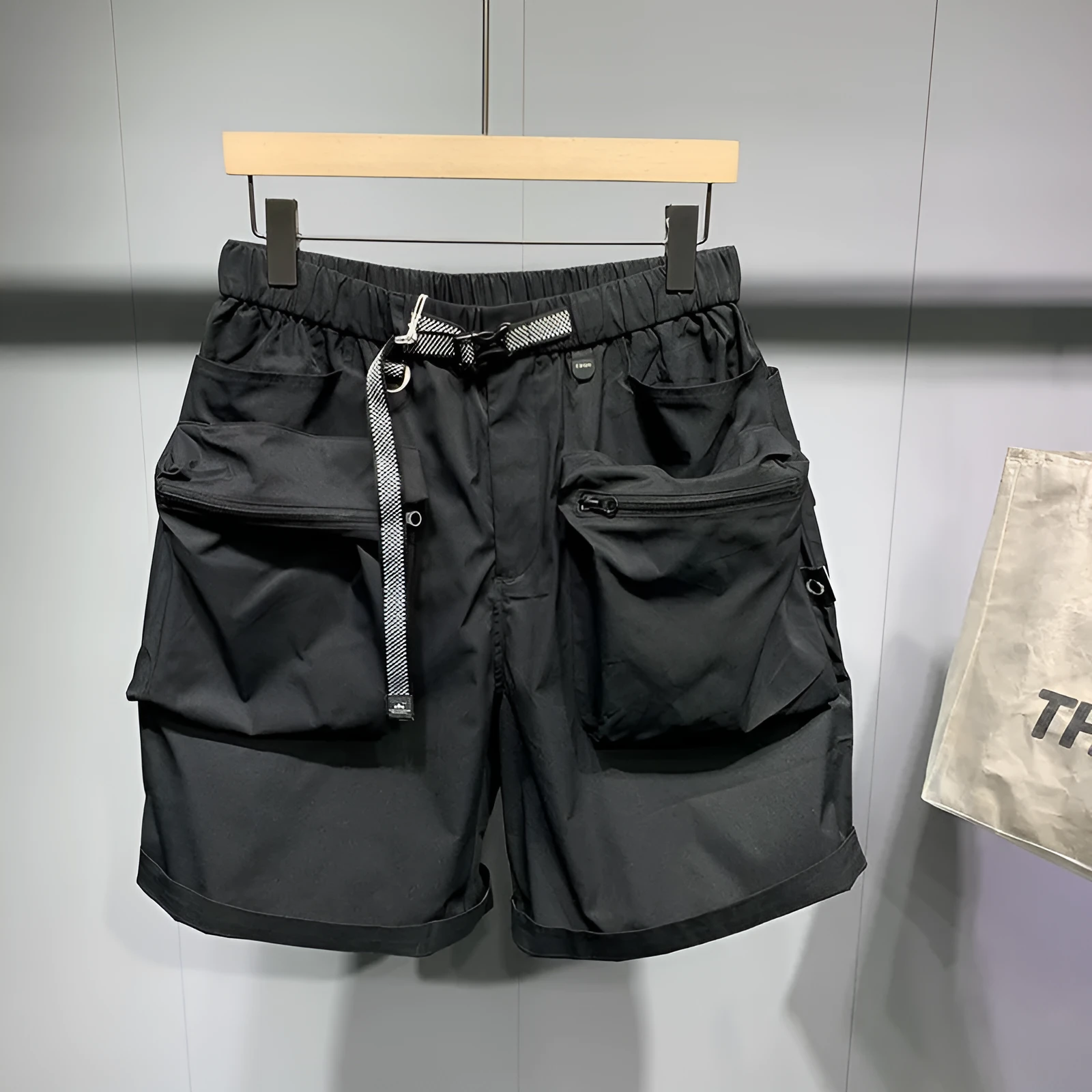 Men's large size work shorts with pockets in black or grey with straight-leg styling