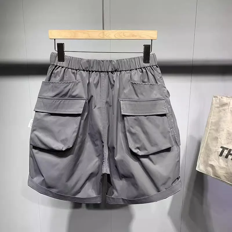 Men's large size work shorts with pockets in black or grey with straight-leg styling