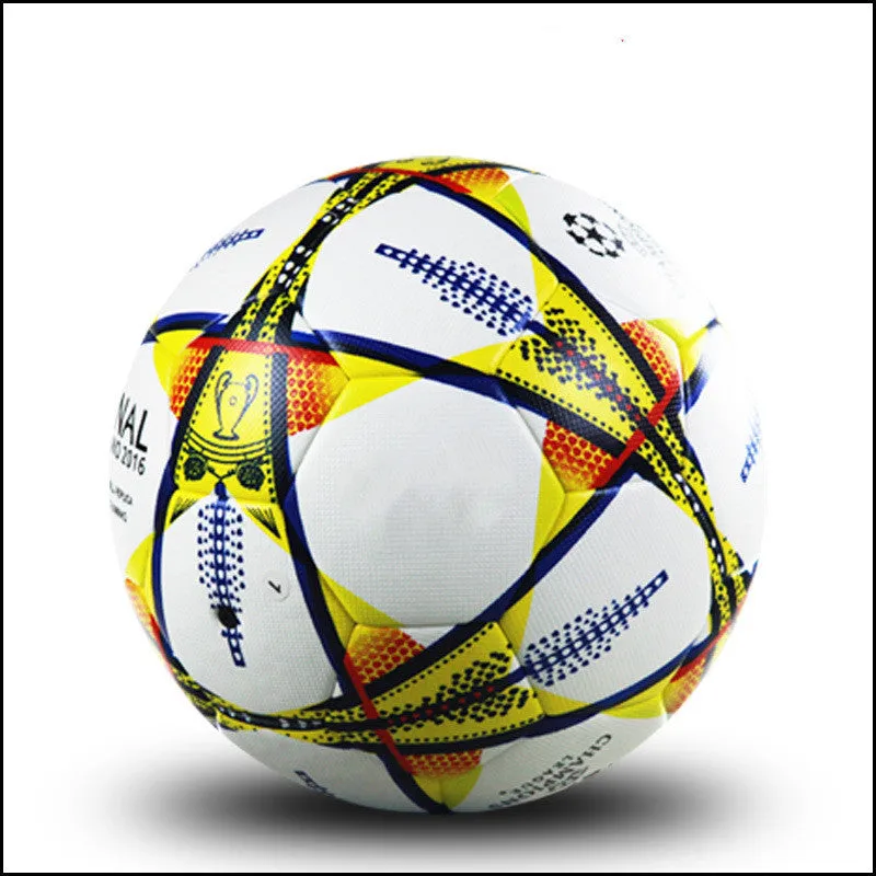 UEFA Champions League PU leather football in multi-colour design with white panels and red accents on grass