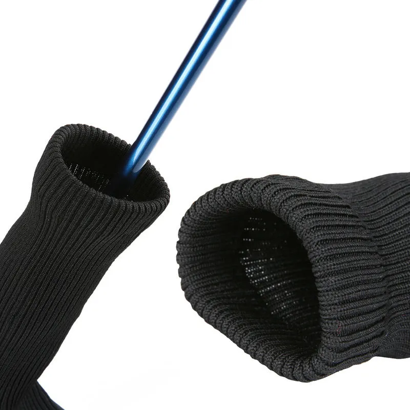 Set of six fabric golf club covers in black, blue, red, and two-tone stripes for driver and fairway wood protection