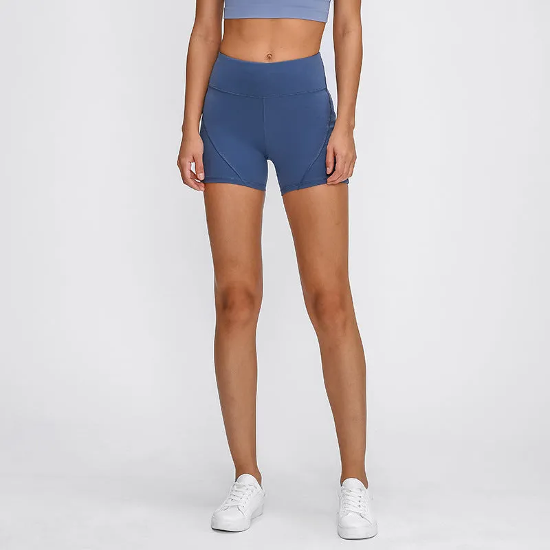 SHINBENE women's high waisted athletic shorts in black with two side pockets and cotton feel nylon spandex fabric